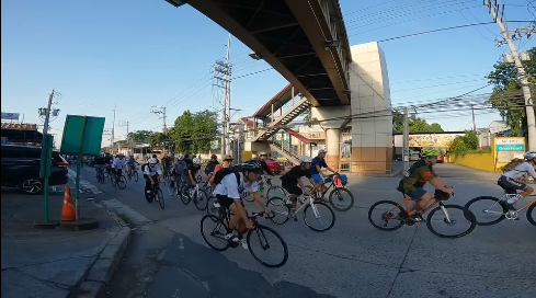 A group of cyclists riding out on the Breakfast Ride